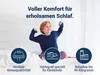 A young boy stretching on a bed, with icons and text highlighting product features. Produktbild-Vorschau