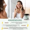 A woman applying face cream in front of a mirror, with product instructions below. Produktbild-Vorschau