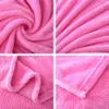 A collage of four close-up images showing the texture and details of a pink fleece blanket. Produktbild-Vorschau