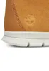 A close-up view of the side of a tan Timberland boot, showing the sole and the embossed Timberland logo. Produktbild-Vorschau