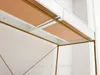 Close-up view of the underside of a white and gold desk, showing the drawer mechanism and corkboard inserts. Anteprima dell’immagine prodotto