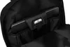 Close-up view of the interior of a black backpack, showing a laptop or tablet stored in a padded compartment. Náhled obrázku produktu