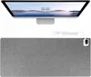 A computer monitor and a large gray desk mat are shown against a white background. Produktbild-Vorschau