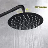 A close-up shot of a black shower head with water flowing from it, mounted on a wall. Produktbild-Vorschau