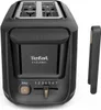 A black Tefal Includeo toaster is shown from the front and side against a white background. Voir les images du produit