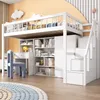 A white loft bed with a desk, shelves, and a wardrobe integrated underneath, set in a child's room with orange walls and decorative clouds. Podgląd zdjęcia produktu