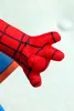 A close-up of a red Spider-Man glove with black web details. Podgląd zdjęcia produktu