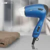 A blue Clatronic travel hair dryer is displayed on a reflective surface next to a folded towel. Anteprima dell’immagine prodotto