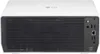 A white LG projector is shown from the front, with its vents and ports visible on the right side. Náhled obrázku produktu