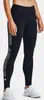 A woman wearing black Under Armour leggings and white sneakers, shown from the waist down against a white background. Produktbild-Vorschau