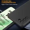 A black phone case is shown on top of a smartphone screen. Podgląd zdjęcia produktu