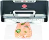 A vacuum sealer is sealing a bag of salmon. Podgląd zdjęcia produktu