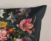 A close-up view of a floral pattern on a dark fabric, likely a duvet cover. Produktbild-Vorschau