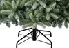 Close-up of the base and lower branches of an artificial Christmas tree. Produktbild-Vorschau