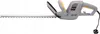 A side view of a gray and yellow electric hedge trimmer on a white background. Náhled obrázku produktu