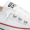 A close-up view of a white Converse Chuck Taylor shoe, focusing on the lacing area and the brand logo. Voir les images du produit