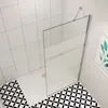 A modern bathroom with a walk-in shower. Produktbild-Vorschau