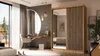 A bedroom scene featuring a wardrobe, vanity, and window with a view. Produktbild-Vorschau