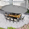 An outdoor dining set with a large double umbrella on a patio. Náhled obrázku produktu