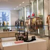 A retail store display with clothing and accessories. Podgląd zdjęcia produktu