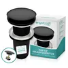 A black pop-up drain fitting with a hair strainer, shown next to its packaging. Produktbild-Vorschau