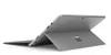A Microsoft Surface Pro 6 tablet is shown from a rear, angled perspective, with its kickstand extended. Produktbild-Vorschau