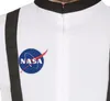 Close-up of a white astronaut suit with a NASA logo on the chest. Produktbild-Vorschau