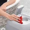 A person's hands are placing a red can into a gray holder on the side of a hot tub. Produktbild-Vorschau
