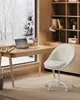 A cozy home office setup with a desk, chair, and a window view of a snowy landscape. Produktbild-Vorschau