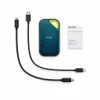A SanDisk portable SSD and its accessories are laid out on a white background. Produktbild-Vorschau