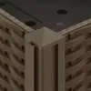 A close-up view of the corner of a brown woven planter box, showing the texture and a corner cap. Náhled obrázku produktu