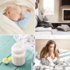 A collage of four images: a sleeping baby, a living room with a fireplace, a baby bottle with formula, and a woman blowing her nose. Produktbild-Vorschau