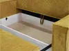Close-up view of the open storage compartment of a sofa. Náhled obrázku produktu