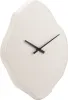 A white, irregularly shaped wall clock with black hands. Voir les images du produit
