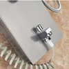 A close-up view of a shower panel with a coiled hose and a button. Náhľad obrázku produktu