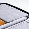 Close-up view of the interior of a laptop bag, showing a padded compartment and a mesh pocket. Anteprima dell’immagine prodotto