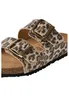 Close-up view of a pair of leopard print sandals. Produktbild-Vorschau