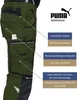 A person wearing green Puma Workwear trousers, with callouts highlighting features. Produktbild-Vorschau