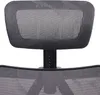 A close-up view of the headrest and upper backrest of an office chair. Náhled obrázku produktu