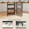 A narrow shelving unit with bottles and jars on shelves, shown in a kitchen setting. The image also includes close-up diagrams of the wheels and construction. Produktbild-Vorschau