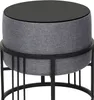 A round, upholstered stool with a black tabletop and a black metal base, shown against a white background. Anteprima dell’immagine prodotto