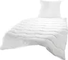 A white duvet and pillow set on a white background. Produktbild-Vorschau
