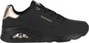 A side view of a black Skechers sneaker with rose gold accents. Voir les images du produit