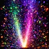 A close-up shot of colorful fireworks or sparklers exploding against a dark background. Produktbild-Vorschau