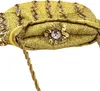 A close-up view of a decorative gold handbag. Produktbild-Vorschau