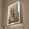 A lit medicine cabinet with a mirror in a bathroom setting. Produktbild-Vorschau