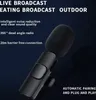 A black wireless microphone with text describing its features. Produktbild-Vorschau