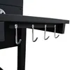 A close-up view of four metal hooks attached to a black shelf under a black surface. Podgląd zdjęcia produktu
