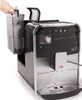 A hand is shown removing the water tank from a coffee machine. Produktbild-Vorschau