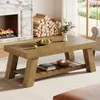 A living room scene with a fireplace, stacked firewood, and a coffee table. Anteprima dell’immagine prodotto